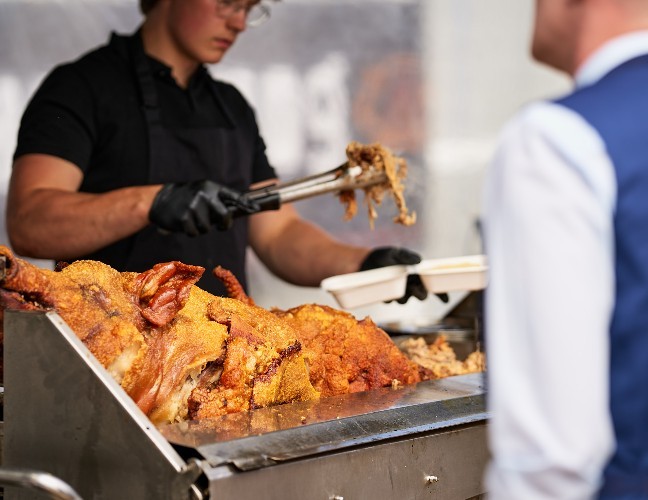 Henderson Fine Food - The Whole Hog logo