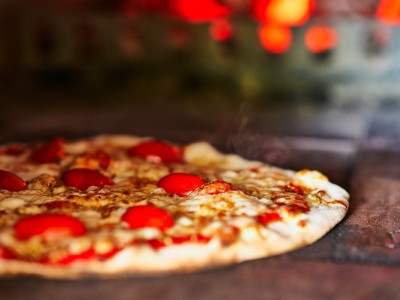 Fresh, handmade, wood-fired pizzas made by Magic 5 Pizza team