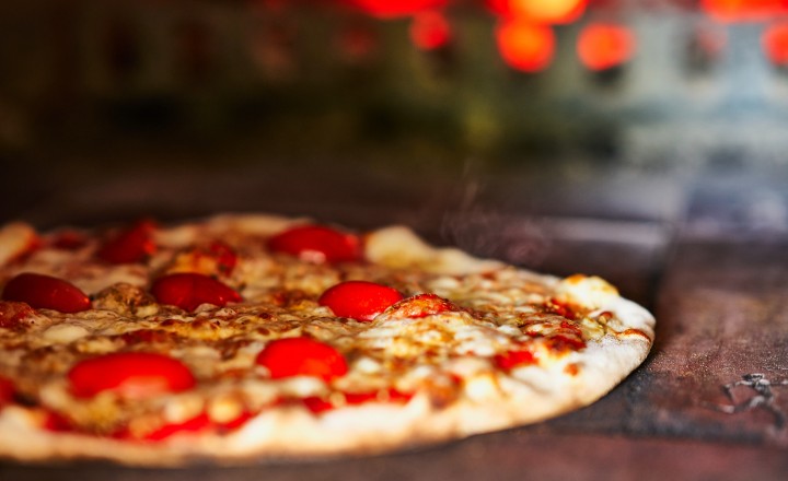 Fresh, handmade, wood-fired pizzas made by Magic 5 Pizza team